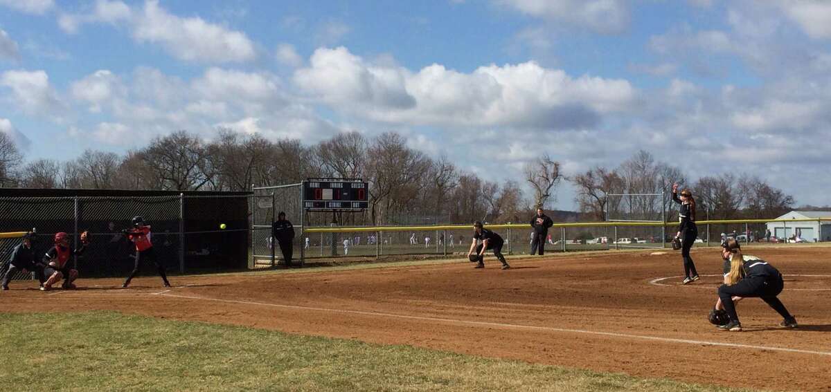 New Canaan and Trumbull open a softball scrimmage at Trumbull High School on Saturday, April 5.