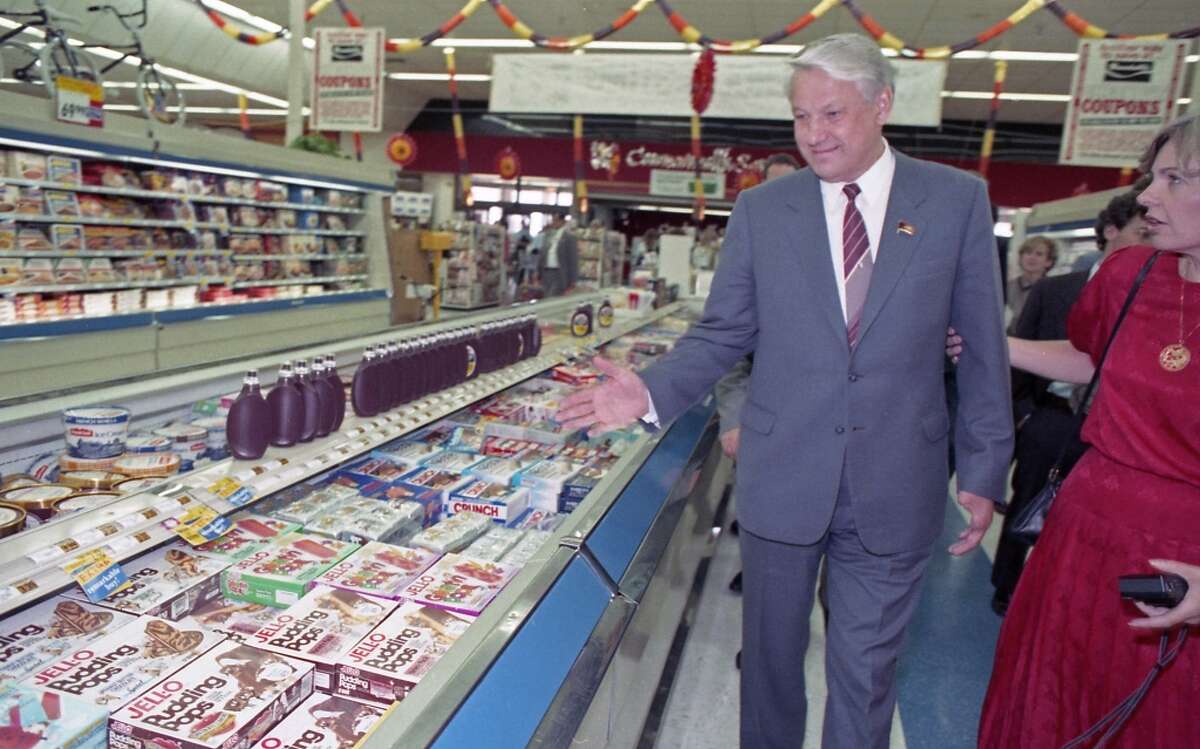 09/16/1989 - Boris Yeltsin and a handful of Soviet companions made an unscheduled 20-minute visit to a Randall's Supermarket after touring the Johnson Space Center. Between trying free samples of cheese and produce and staring at the frozen food selections, Yeltsin roamed the aisles of Randall's nodding his head in amazement.