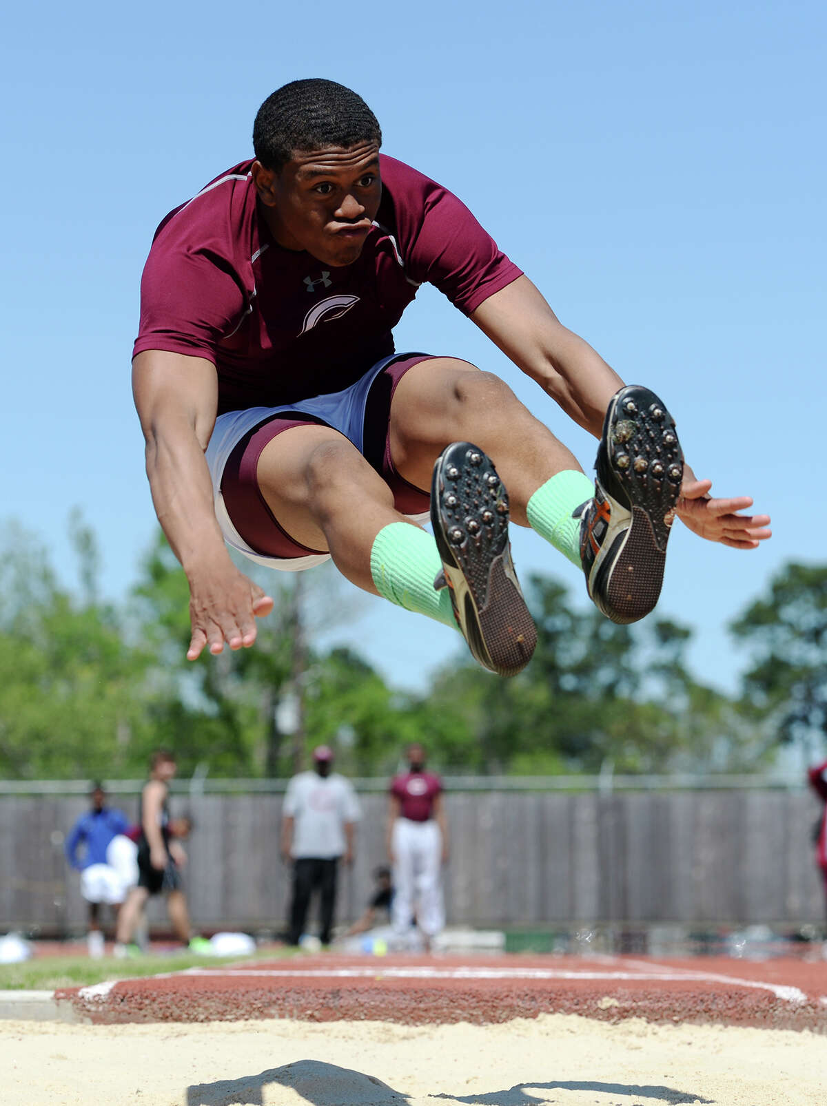 Central's Devwah Whaley preps for his landing while competing in the long jump event at Monday's meet. The District 20-4A track meet was held at Babe Zaharias Park on Monday. Photo taken Monday, 4/7/14 Jake Daniels/@JakeD_in_SETX