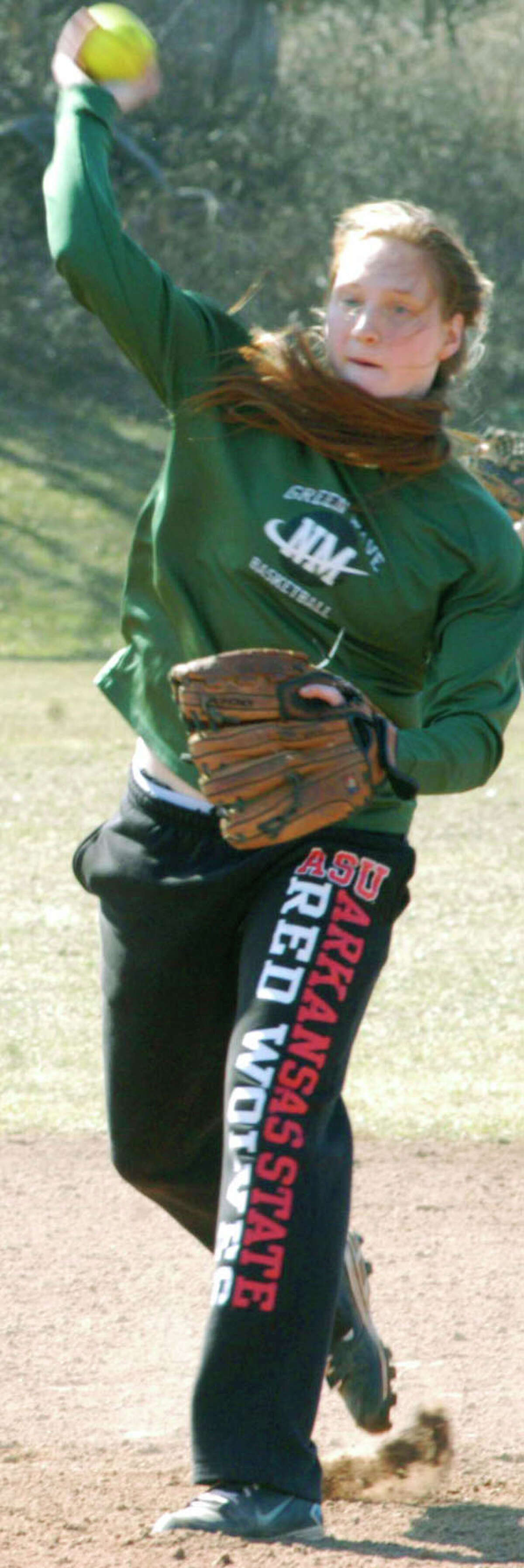 Veteran infielder Maggie Grubb of the Green Wave preps for the 2014 campaign for New Milford High School softball, April 2014