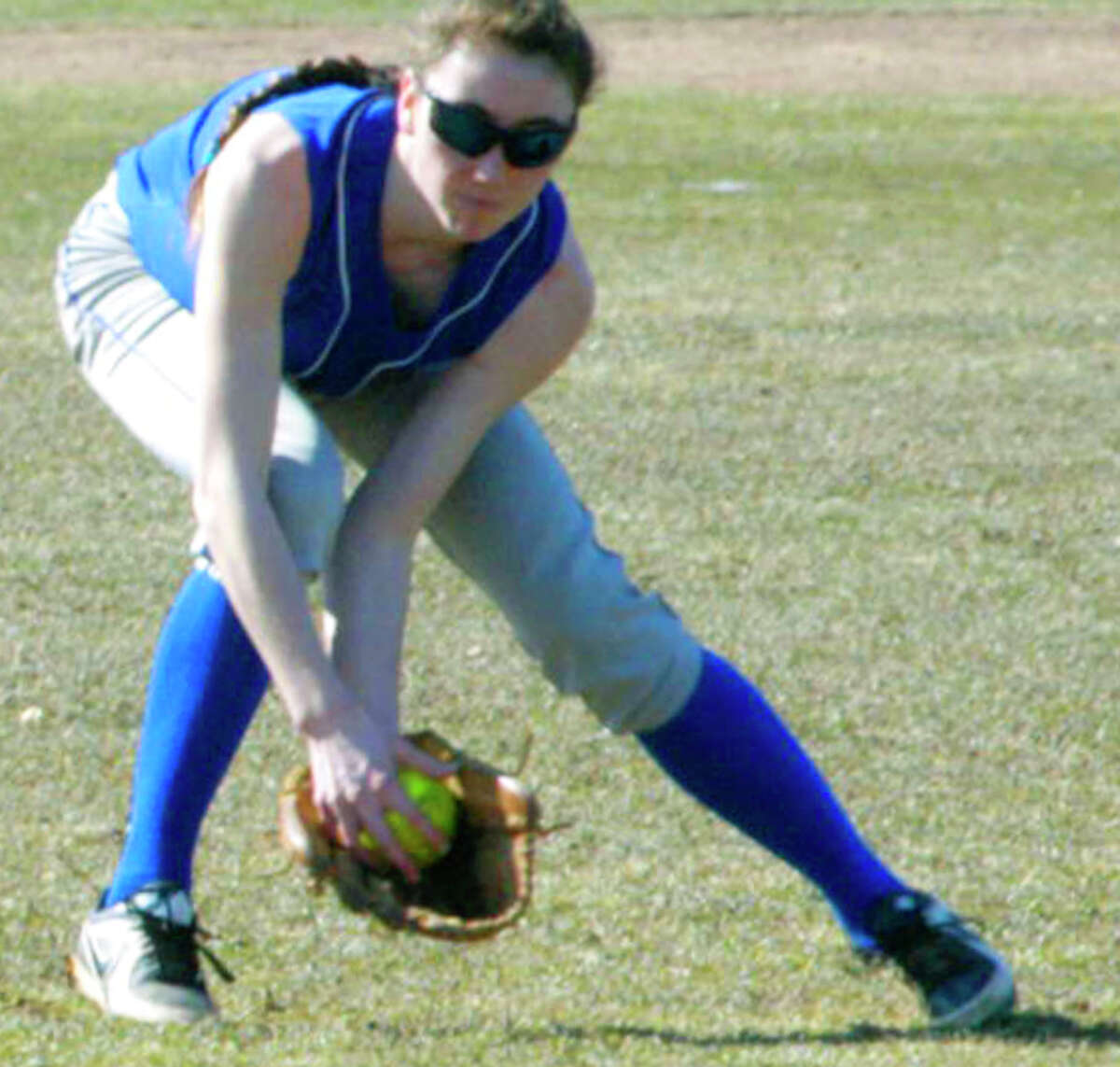 Maribeth Seeger of the Spartans deftly fields a shot to the outfield for Shepaug Valley High School softball, April 2014