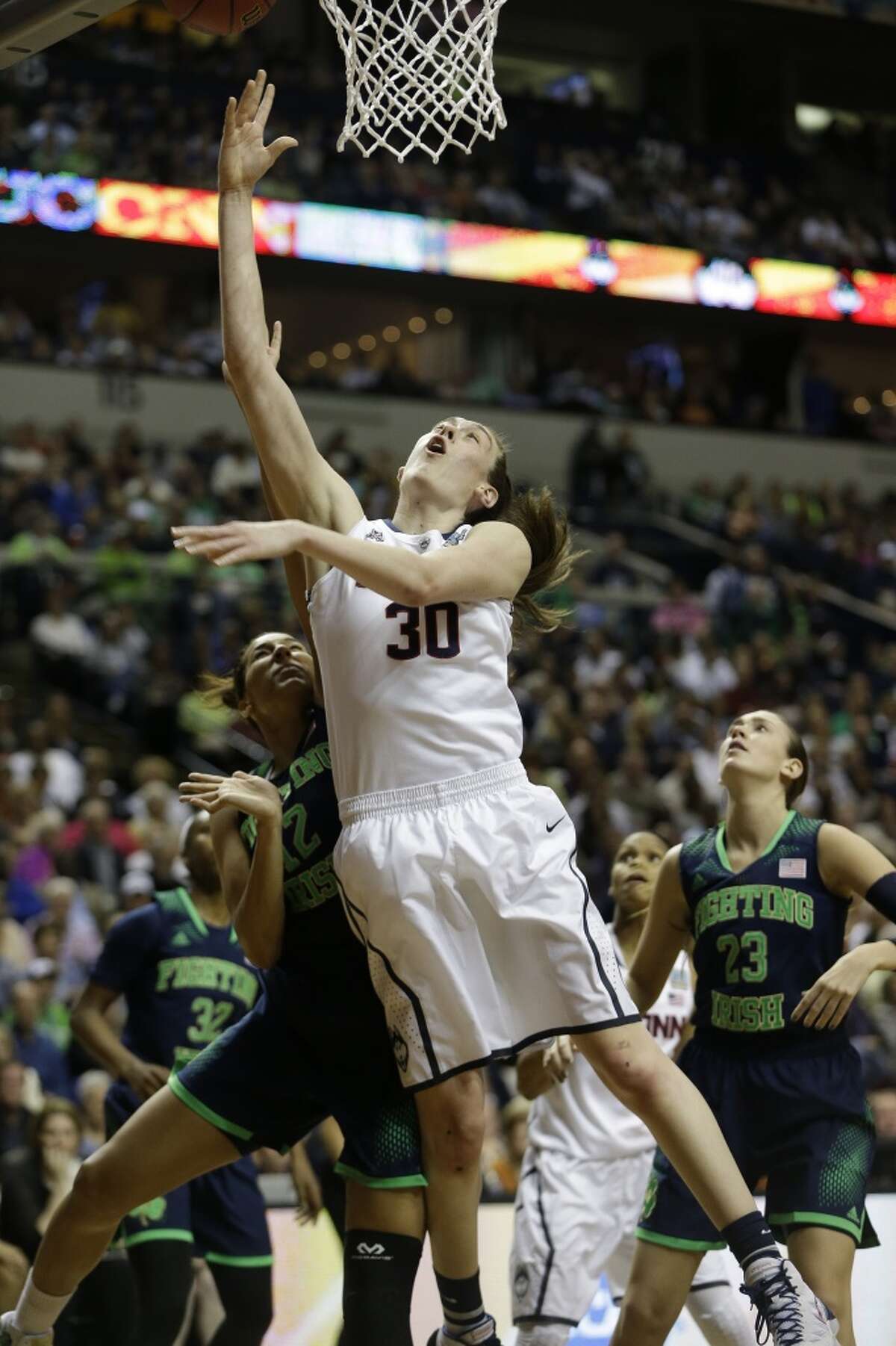 Kevin Duffy Auriemma, UConn women in class by themselves