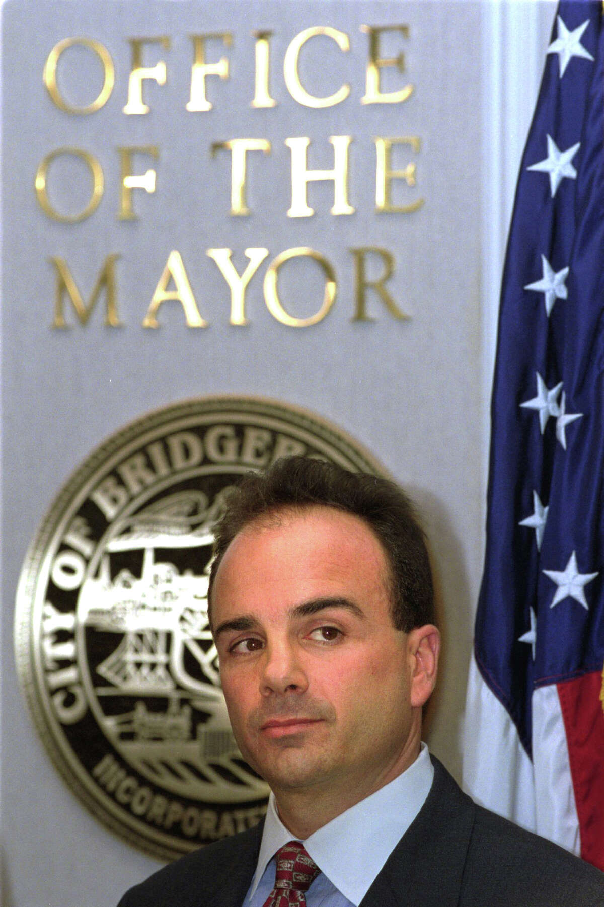 Bridgeport Mayor Joseph P. Ganim looks on Oct. 31st, 2001, during a press conference outside the Office of the Mayor at City Hall Annex on the day a federal grand jury indicted him on 24 felony charges including racketeering, bribery, extortion, mail fraud and tax evasion.