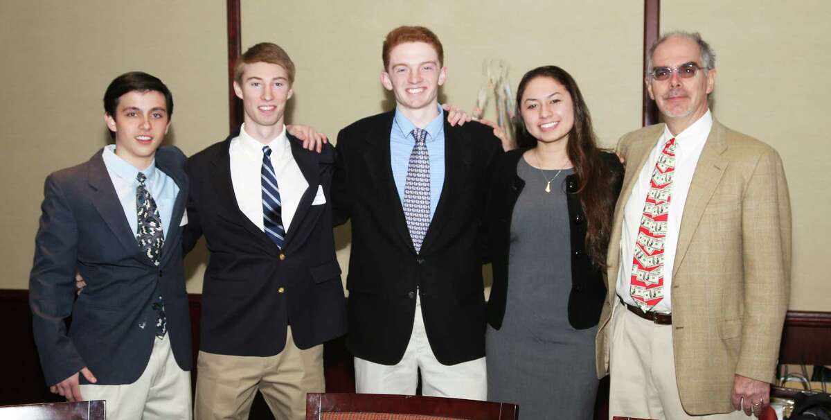 The Fairfield Ludlowe High School team won the High School Business Challenge sponsored by Junior Achievement. Each student was awarded a $1,000 scholarship. Team members are, from left: Evan MacGuffie, Brett Dammeyer, Billy Moeder and Isabele Chediak, and their advsor, teacher Thomas Reindel.