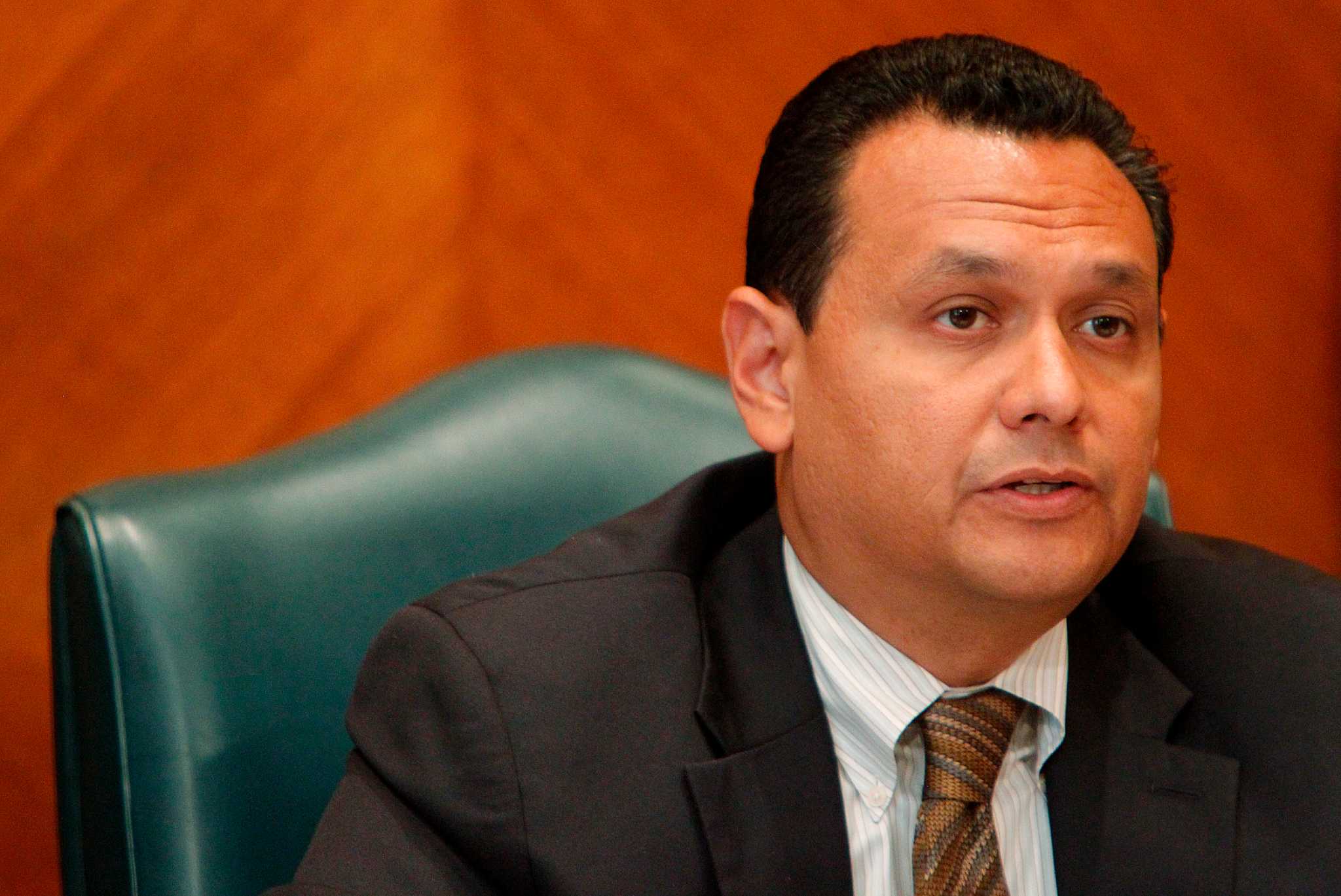 Gonzalez suspends himself over homicide case files