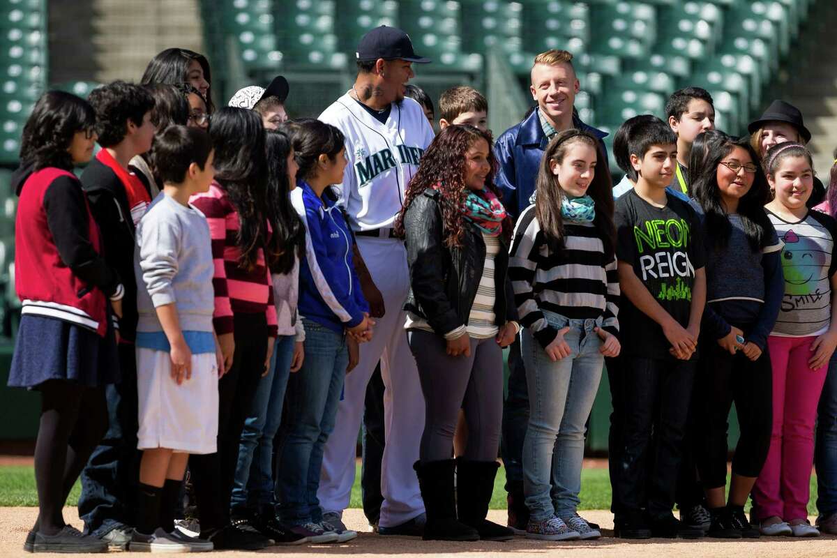 A group of Seattle area middle school students were in for a surprise when Mariners pitcher Felix Hernandez and Grammy Award-winning artist Macklemore showed up on the set of an anti-bullying campaign Thursday, April 10, 2014, at Safeco Field in Seattle. The Seattle Mariners are participating in an anti-bullying campaign targeted at middle school students in Washington, with a component of the campaign being public service announcements for radio and TV.