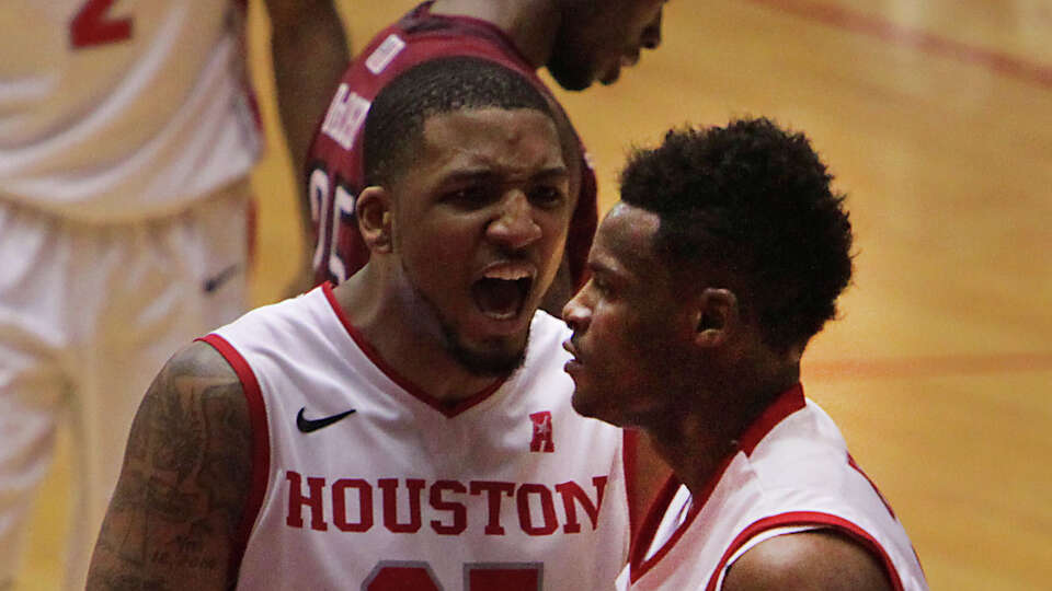 Senior forward TaShawn Thomas, left, and junior guard Danuel House said the University of Houston's decision to hire Kelvin Sampson as head coach James Dickey's successor played a part in their decisions to transfer out of the program.