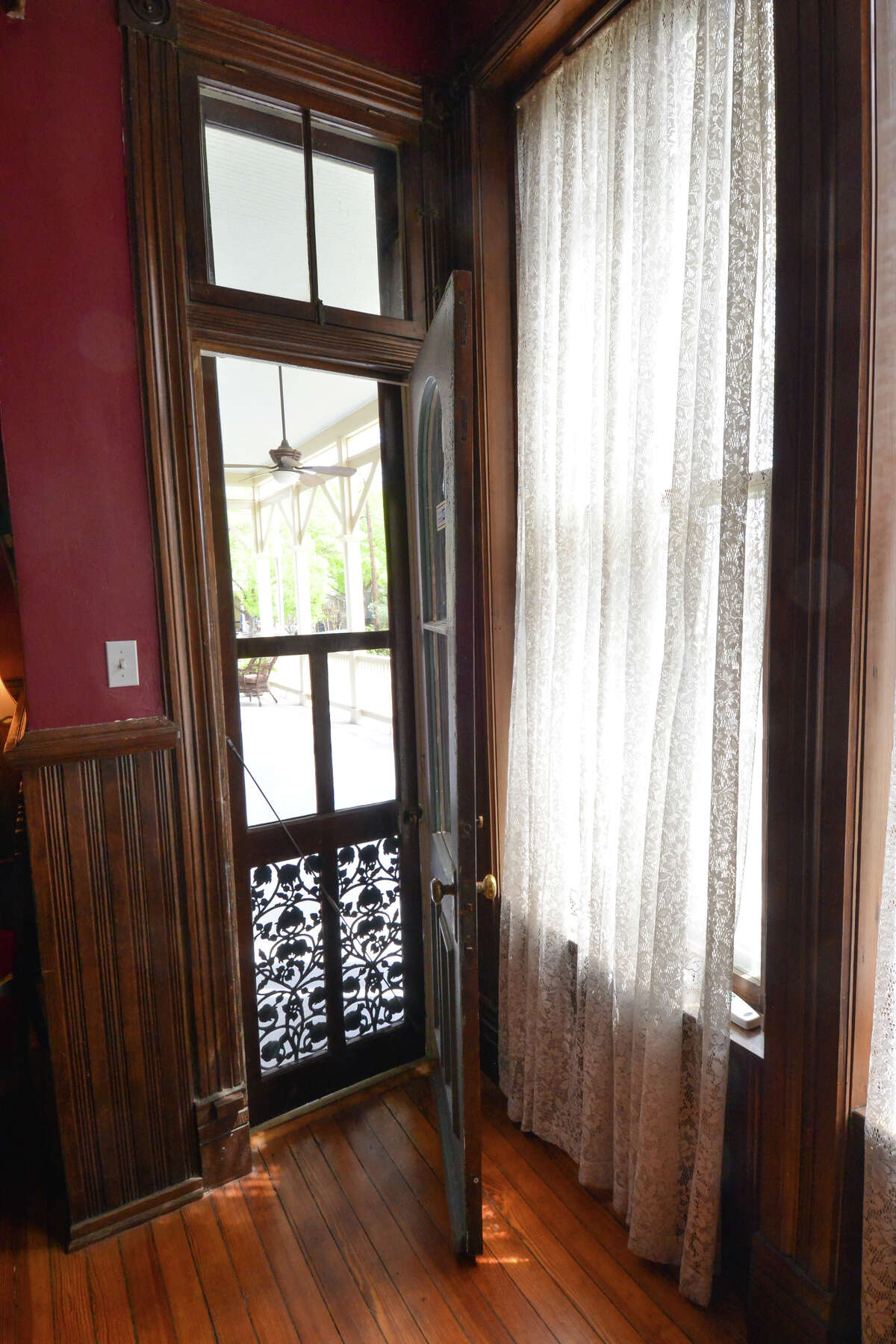 A narrow door leads to the porch of the King William district home of Belinda Molina.