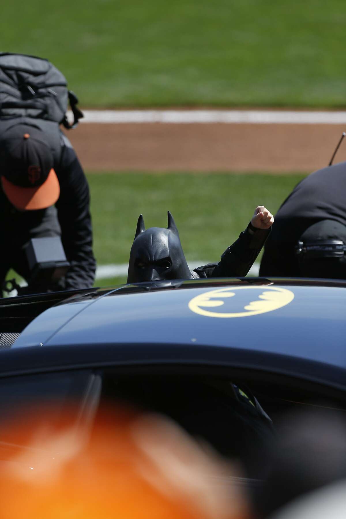 Batkid emerges from the Batmobile during opening ceremonies as the San Francisco Giants prepare to take on the Arizona Diamondback during their home opener at AT&T Park on Tuesday April 8, 2014, in San Francisco, Calif.