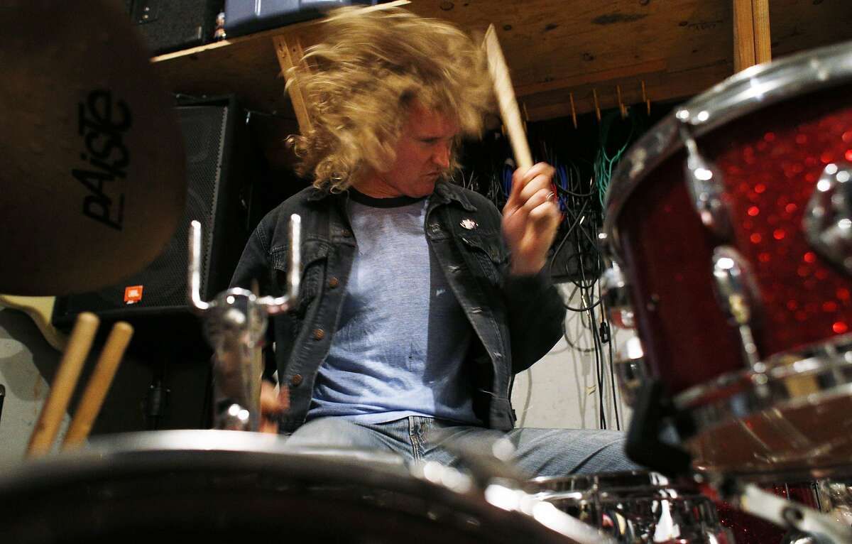 Rob Alper, drummer for Hot Lunch, practices at Secret Studios in San Francisco, Calif., on Thursday, April 10, 2014.