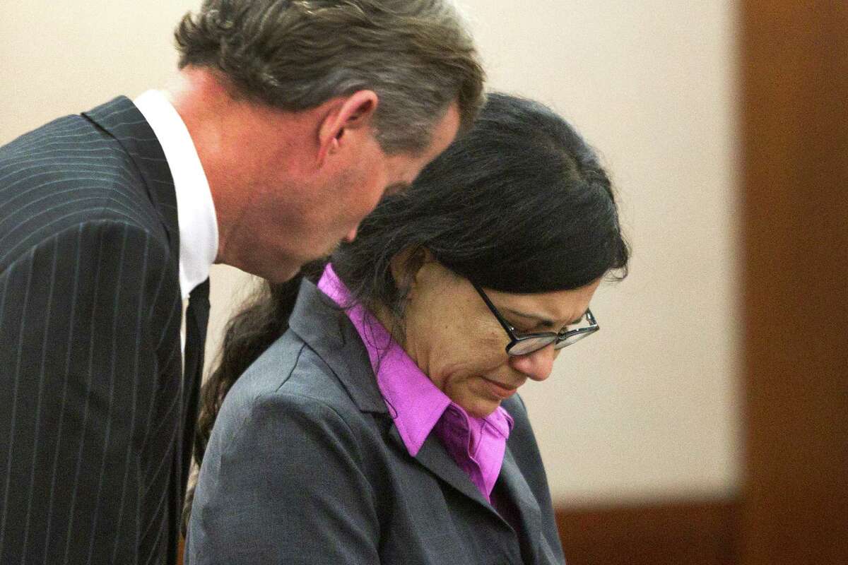 Ana Trujillo stands with her attorney, Jack Carroll, left, as she is sentenced to life in prison for killing her boyfriend with the heel of a stiletto shoe Friday, April 11, 2014, in Houston. Trujillo was convicted in the brutal 2013 slaying of, Alf Stefan Andersson, using a 5-inch stiletto shoe.