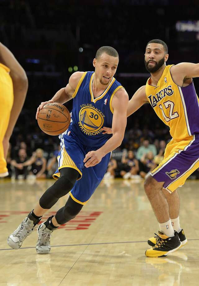 Showtime: Warriors clinch playoff berth on Lakers' court ...