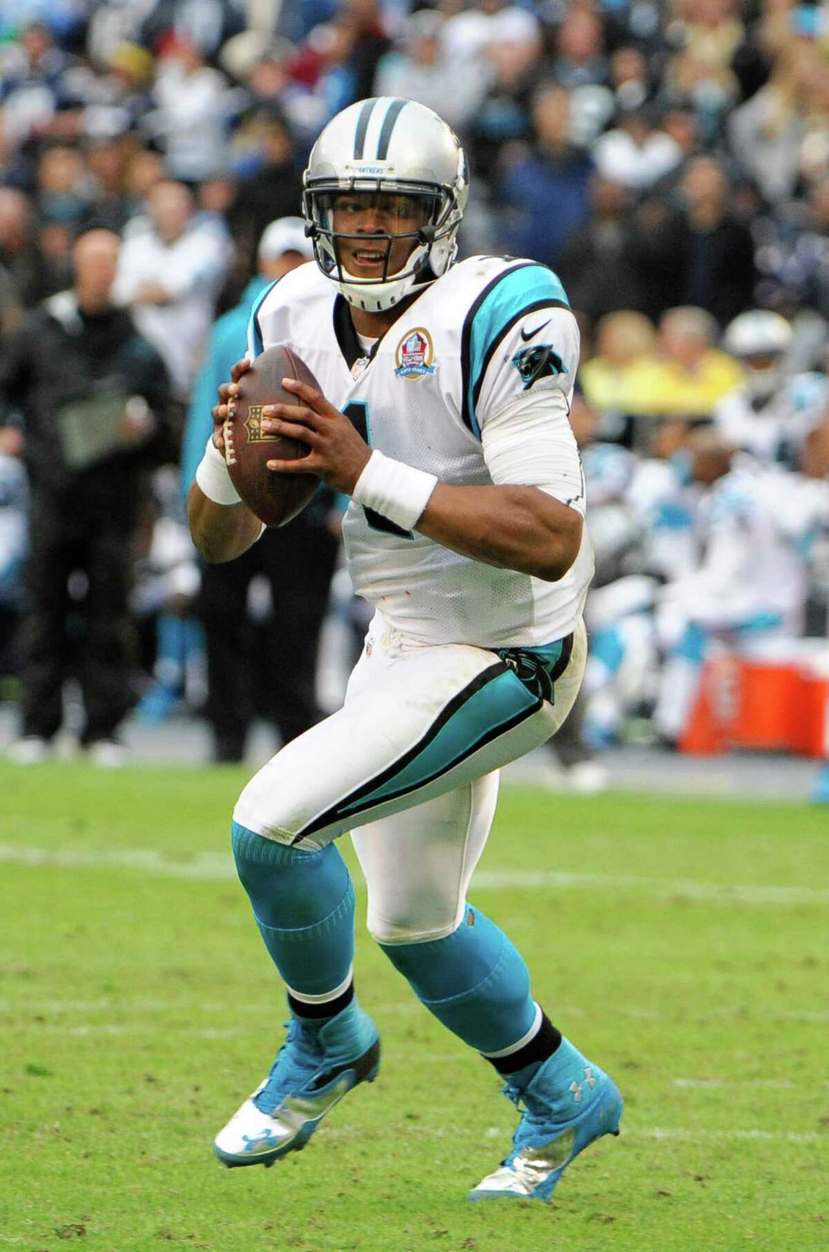 Carolina Panthers quarterback Cam Newton (1) throws during first half of an NFL football game against the San Diego Chargers Sunday, Dec. 16, 2012, in San Diego. (AP Photo/Denis Poroy)