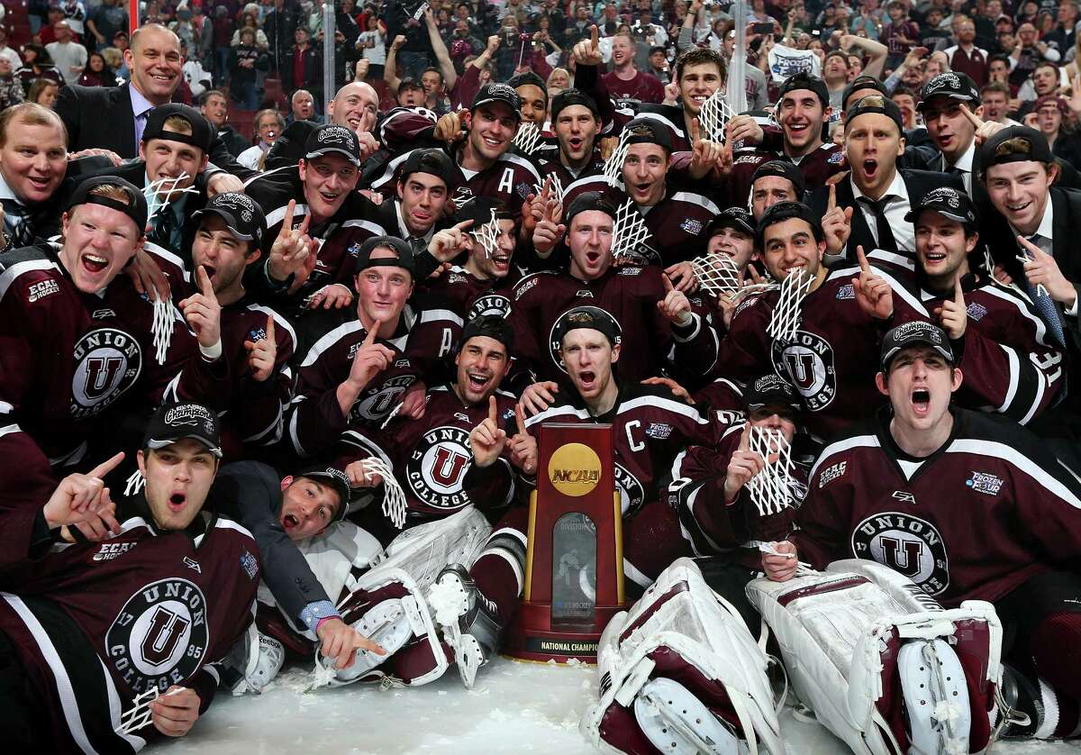 PHILADELPHIA, PA - APRIL 12: The Union College Dutchmen celebrate their win over the Minnesota Golden Gophers during the 2014 NCAA Division I Men's Hockey Championship Game at Wells Fargo Center on April 12, 2014 in Philadelphia, Pennsylvania.The Union College Dutchmen defeated the Minnesota Golden Gophers 7-4 to win the national title. (Photo by Elsa/Getty Images) ORG XMIT: 464911487