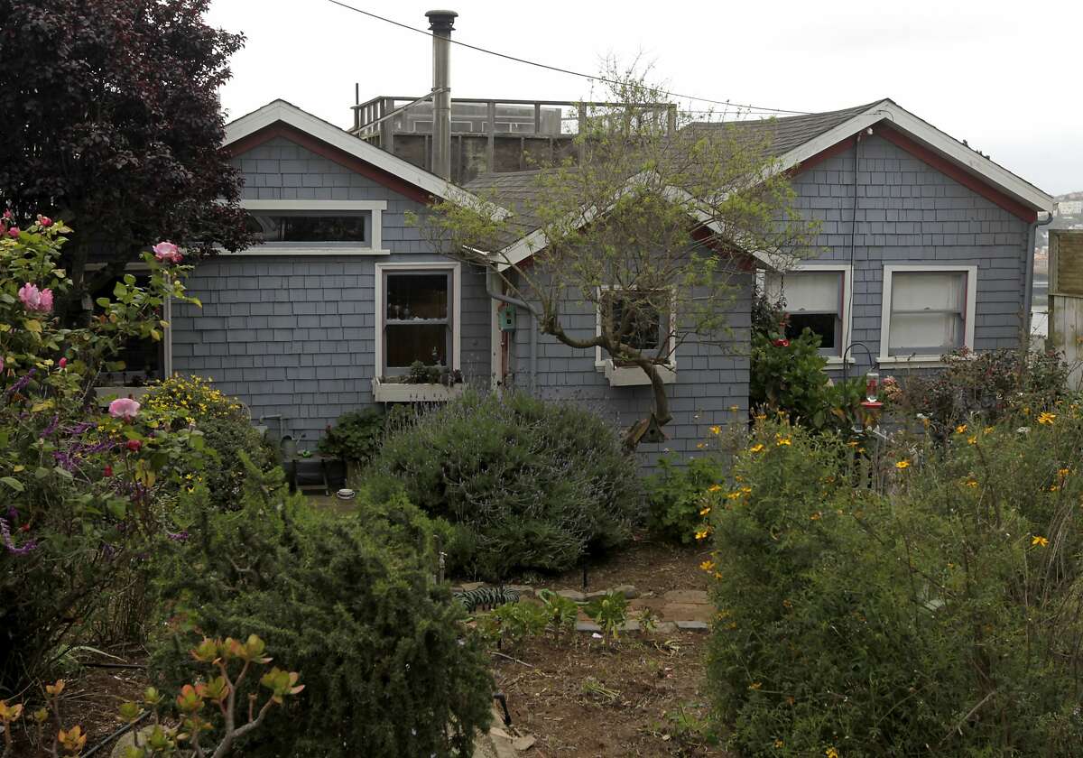 A pair of refugee shacks, built to house 1906 earthquake survivors, is now a home on Carver Street in Bernal Heights in San Francisco, Calif. on Friday, April 11, 2014.