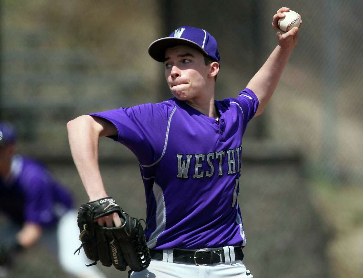Westhill starting pitcher Dan Rotkewicz (#18) won a decision against Ridgefield High School on Monday, April 14, 2014 in Stamford, Conn. Westhill held on for closely fought 5-4 win.