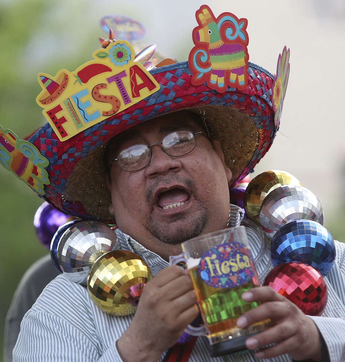 Leonard Alonzo celebrates at Fiesta 2014. The column writer proposes new Fiesta medals.