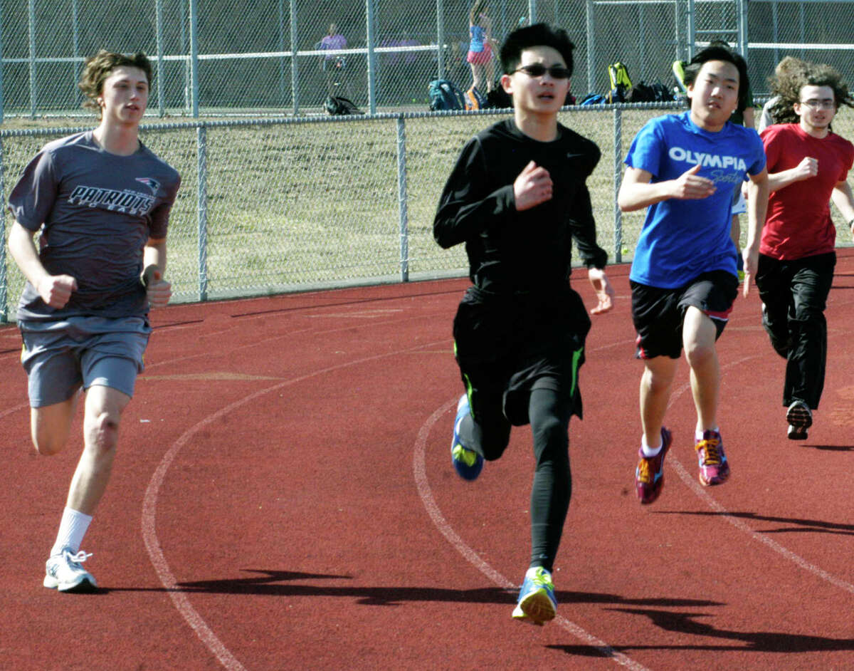 The Green Wave practices for the New Milford High School boys' track season. April 2014