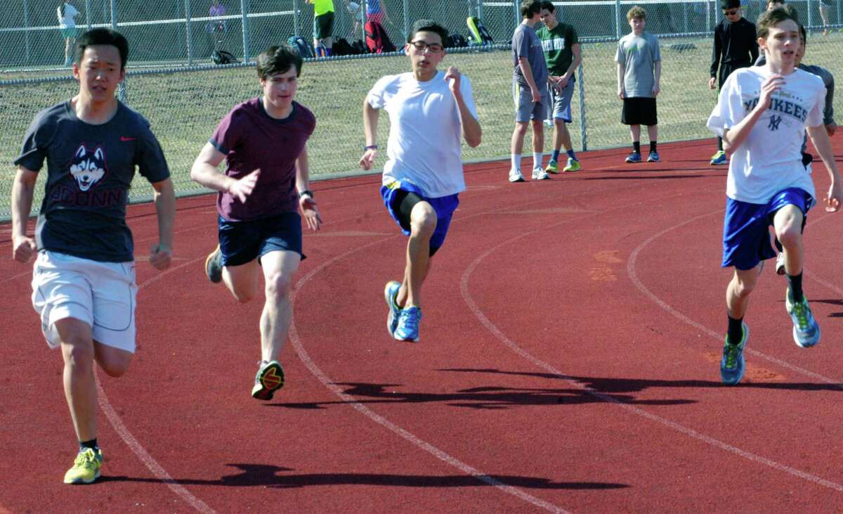 The Green Wave practices for the New Milford High School boys' track season. April 2014