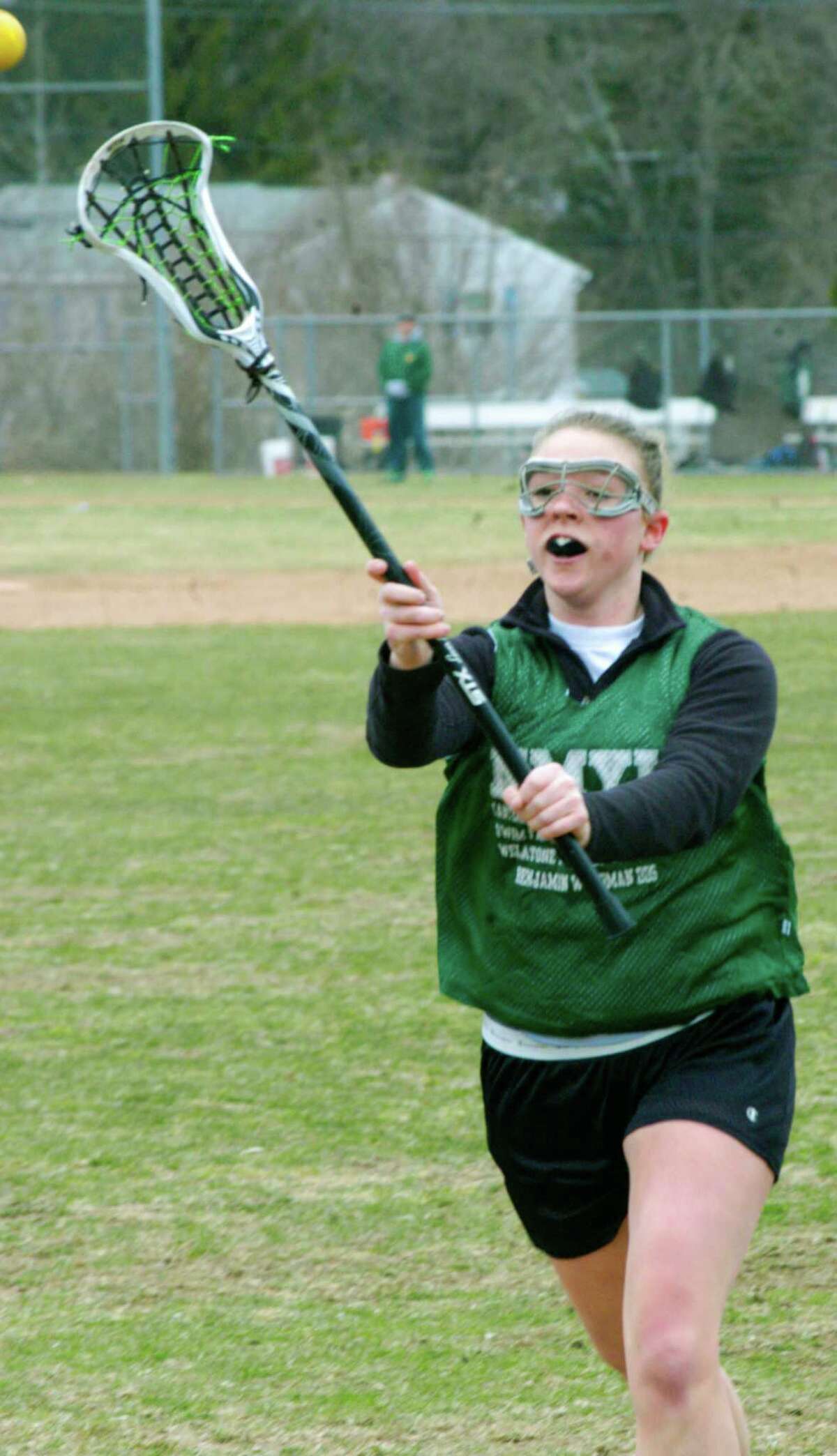 The Green Wave's Dakota Casarella gears up for New Milford High School girls' lacrosse. April 2014