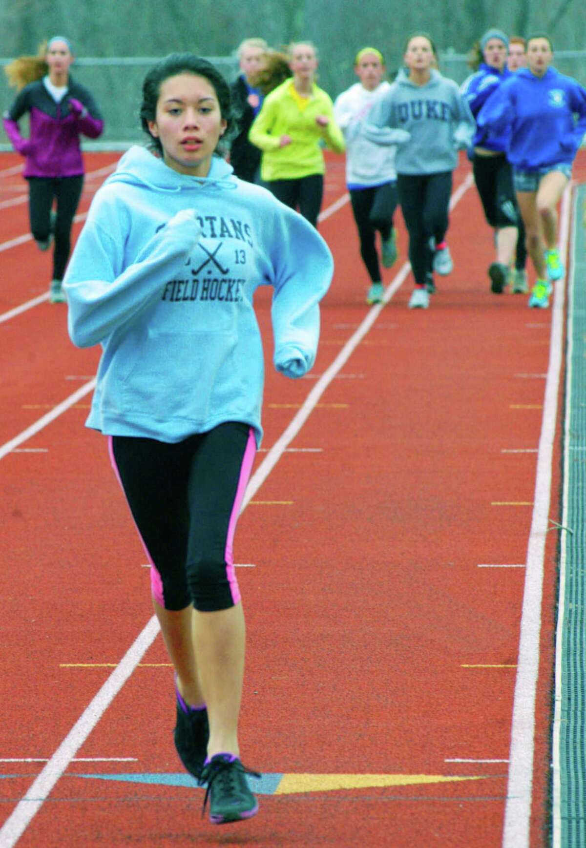 The Spartans' Tia Phon keeps a brisk pace during pre-season prep for the Shepaug Valley High School girls' track season. April 2014