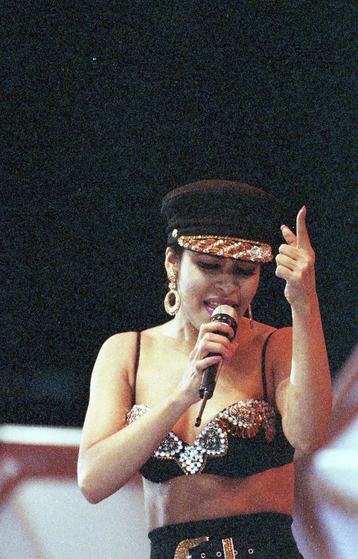 02/28/1993 - Selena performs at the Houston Livestock Show and Rodeo inside the Astrodome. The concert drew 66,994 people and set an all-time attendance record.