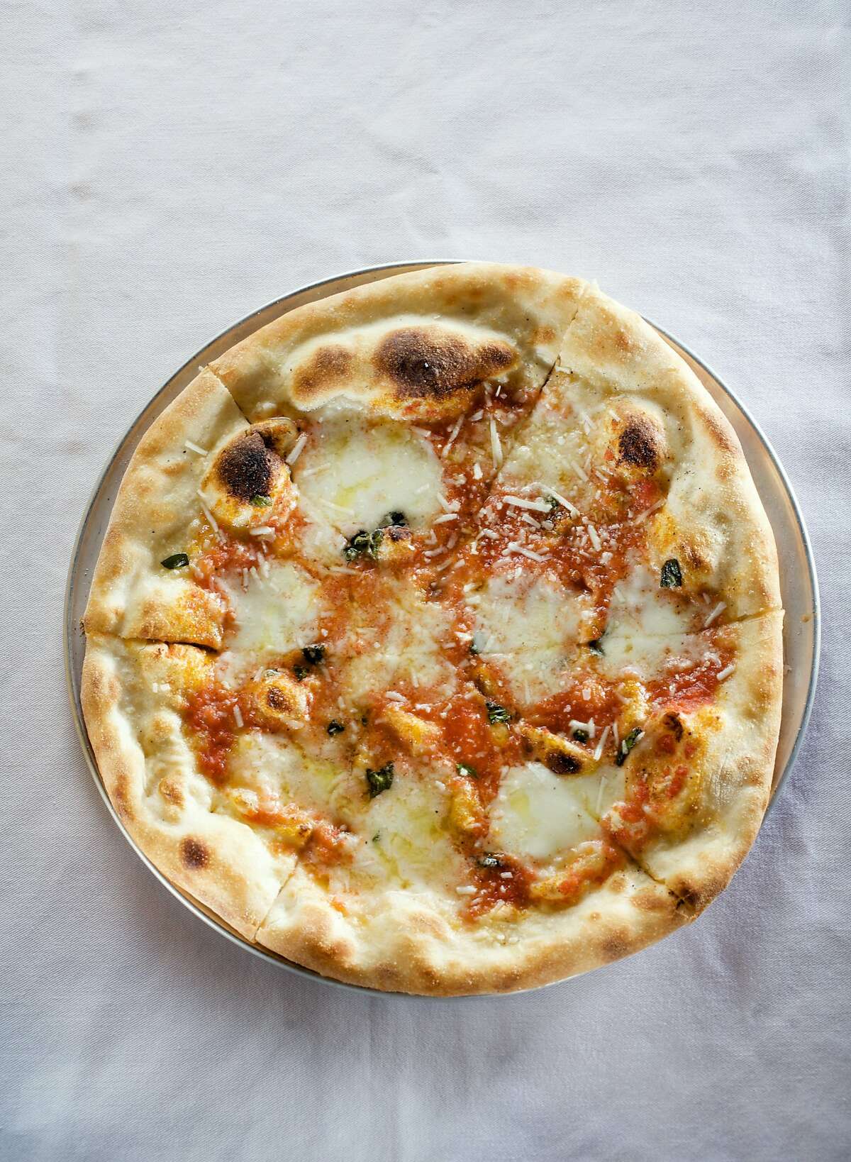 OAKLAND, CALIF - MARCH 7: The Bufala Mozzarella and Oregano Pizza at Dopo. BY JOHN LEE / SPECIAL TO THE CHRONICLE