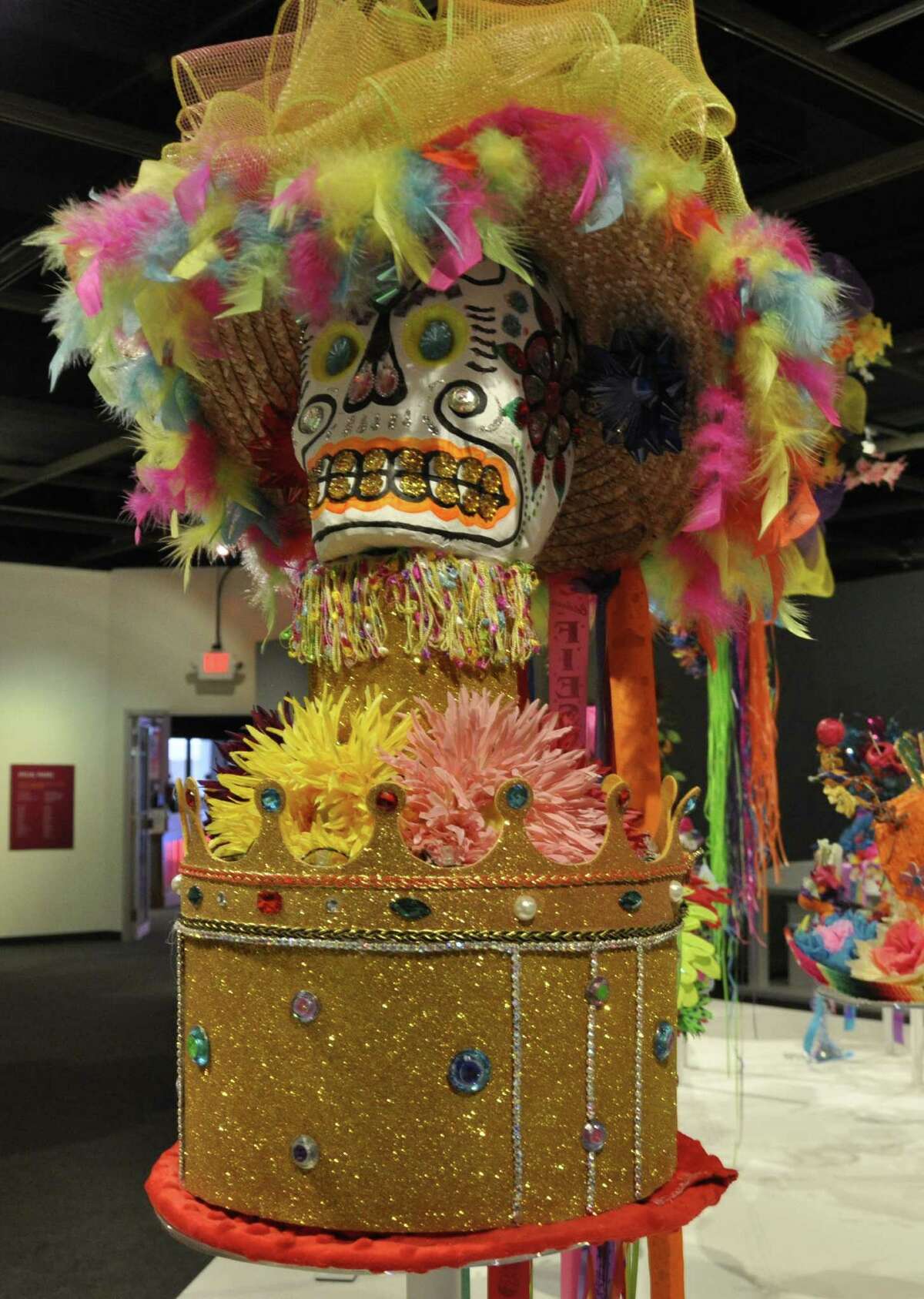 Mike Taylor's “King Hat of Hats” is also part of the exhibit.
