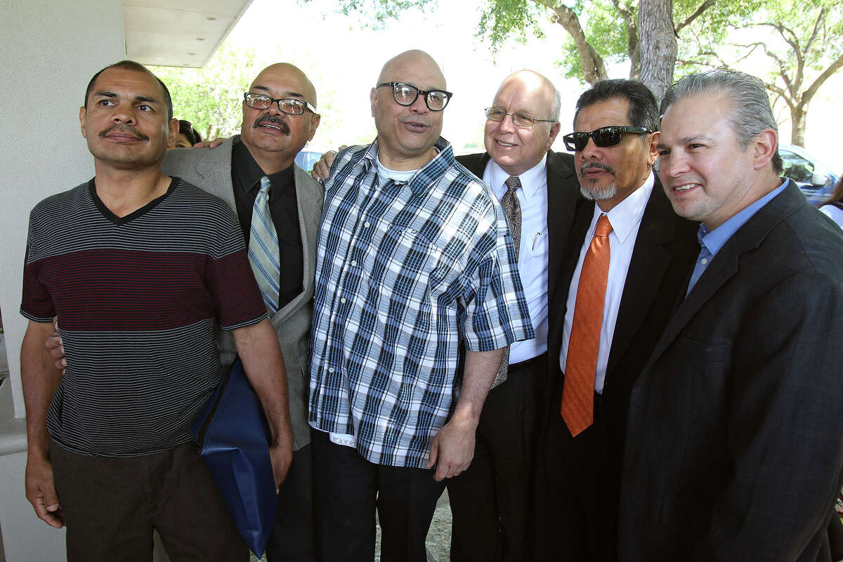 The four Ayala brothers . (from left , Paulie , Sam, Tony, Jr. and Mike second from right) stand for pictures as Tony Ayala Sr. is remembered at funeral services at Palm Heights Mortuary and Ft. Sam Houston National Cemetery on April 16, 2014.