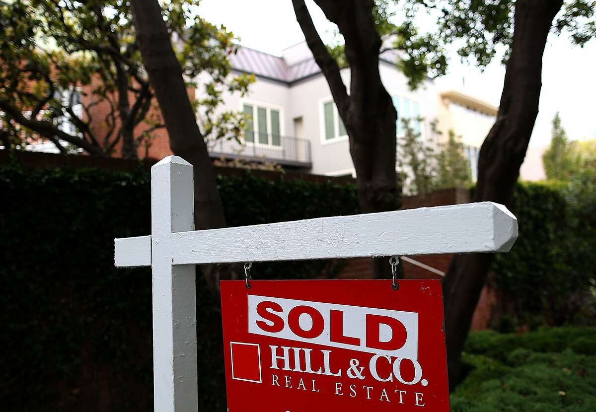 According to reports, US existing home sales fell in January to its lowest level since July 2012. A sold sign is posted in front of a home for sale on July 30, 2013 in San Francisco, California. According to the S&P/Case Shiller composite index survey of 20 metropolitan areas, home prices increased 2.4 percent in May, their highest level since 2006. San Francisco home prices skyrocketed 24.5 percent. (Photo by Justin Sullivan/Getty Images)