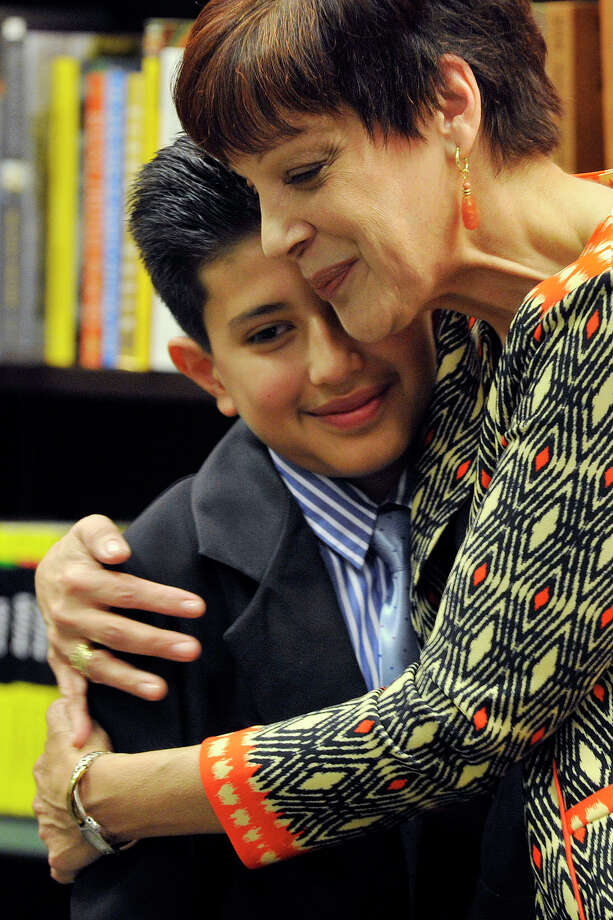 Stamford Students Essay Wins Award For Teacher Stamfordadvocate Miriam Gonzerelli Hugs Her Student Luis Guaillas After He Read His Winning Essay