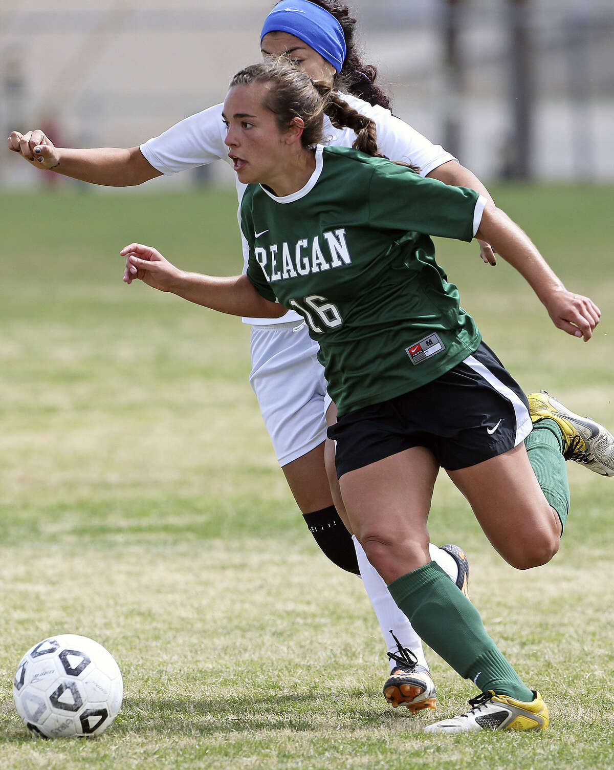 Nicole Galan (front) has been a vital member of Reagan's midfield contingent that has helped guide the Rattlers to today's Class 5A state semifinals in Georgetown.