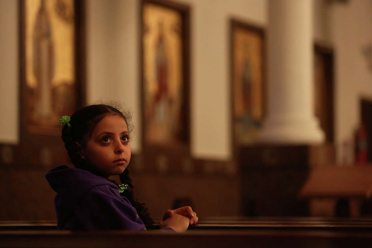 Tina Hanna, 6, attends Evening Pascha for Holy Week at St. Antony The Great Coptic Orthodox Church in San Antonio on Tuesday, April 15, 2014.