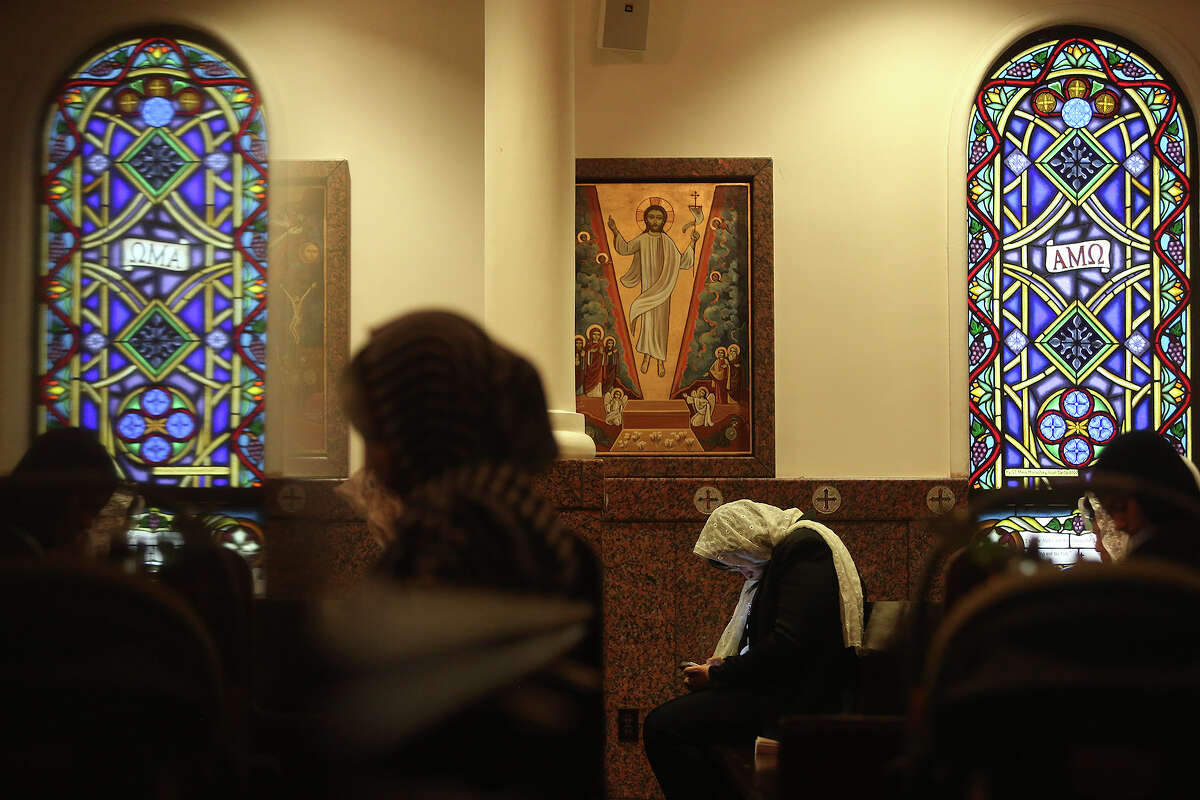 Worshippers recite and sing hymns during Evening Pascha for Holy Week at St. Antony The Great Coptic Orthodox Church in San Antonio on Tuesday, April 15, 2014.