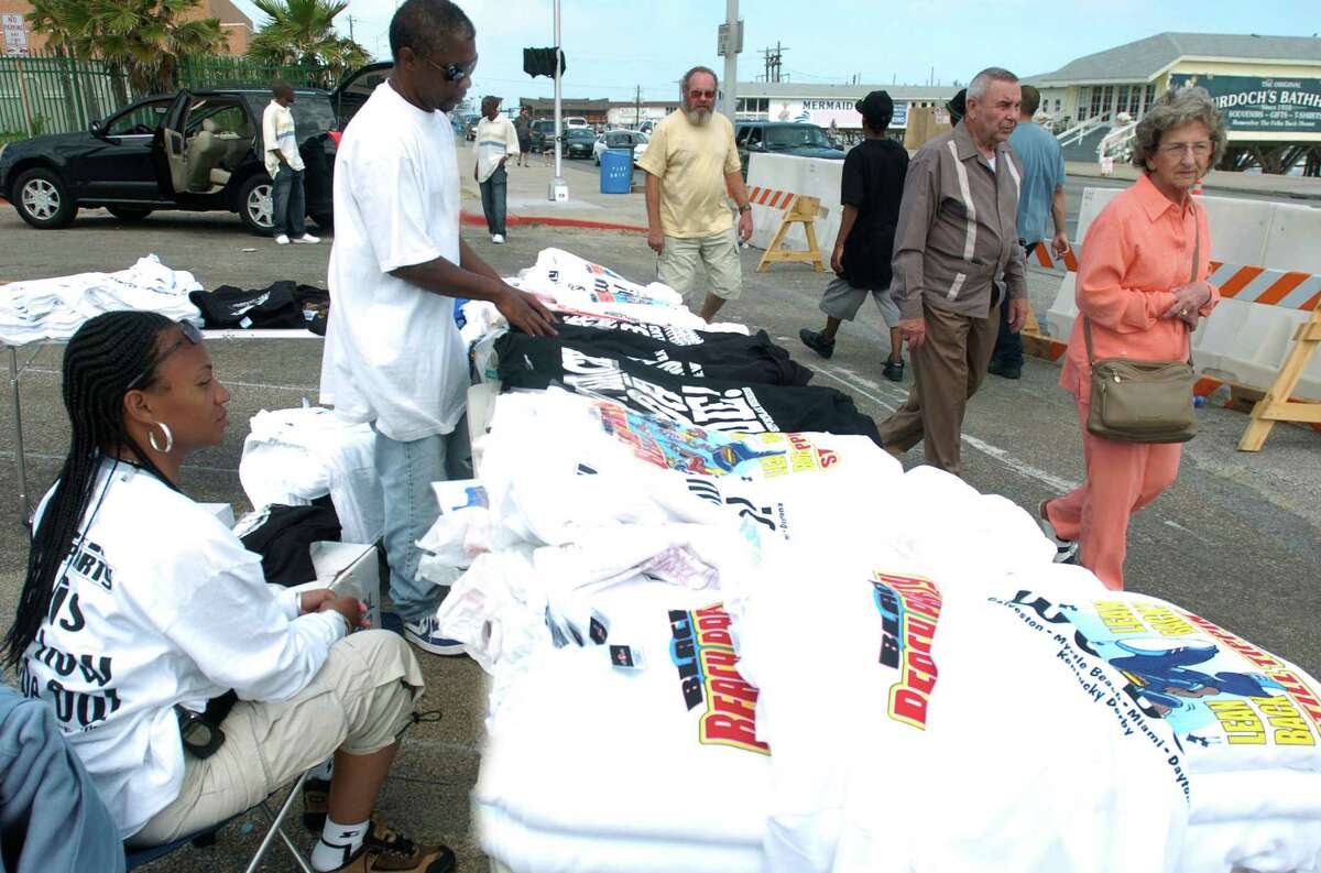 Vendors, Ed Kittrell, top right, and Cathy Jordan, bottom right, wait for costumers during Beach Party on Sunday, April 17, 2005, in Galveston. Jordan and Kittrell said not only are the crowds down but they also faced harassment from the City of Galveston. "An individual from the city tried to confiscate our merchandise even after we showed him our permit," said Jordan as Kittrell agreed. 