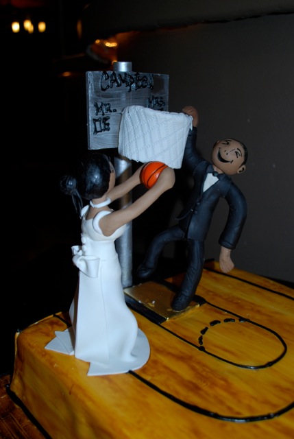 World Cake Topper. San Francisco 49ers fan groom & school teacher bride  wedding cake topper