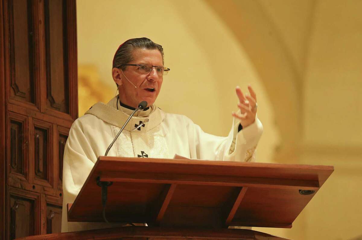 Archbishop Gustavo Garcia-Siller speaks during Holy Thursday mass held at San Fernando Cathedral Thursday April 17, 2014.