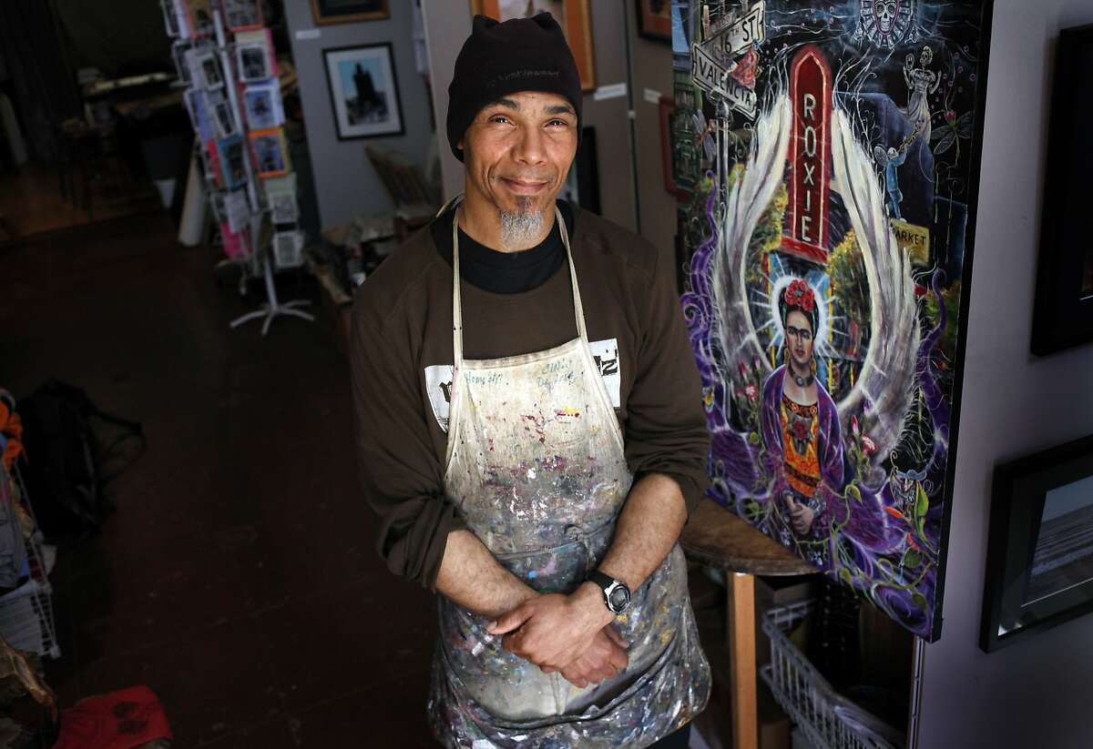 Ronnie Goodman stands next to one of his paintings from his Frida Kahlo series which is on display at The Gallery in the Lower Haight, Thursday April 17, 2014, in San Francisco, Calif. Ronnie is homeless and is a serious runner training for marathons. He uses his running passion to keep himself focused and moving forward into stability and housing.
