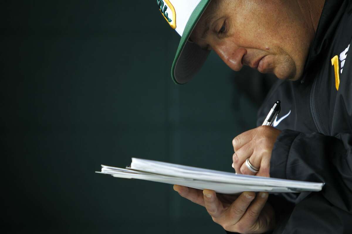 USF's Nino Giarratano embraces coaching son, Nico