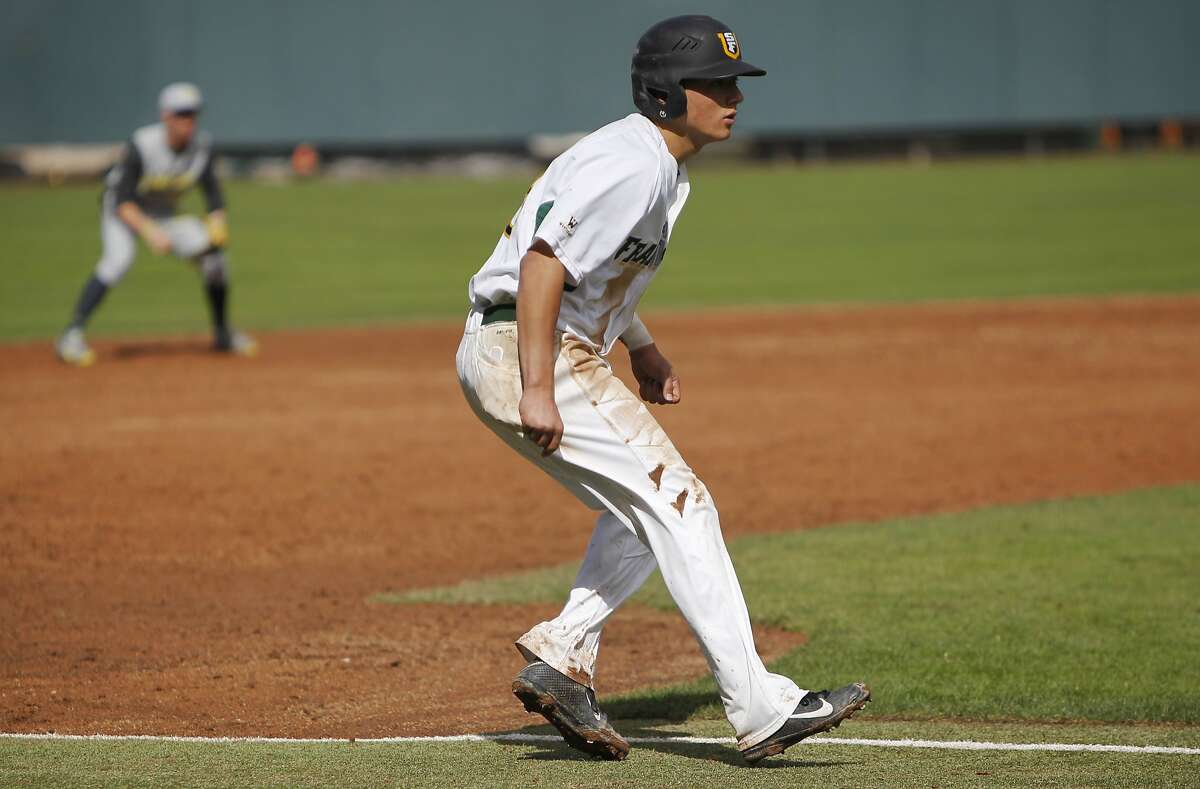 USF's Nino Giarratano embraces coaching son, Nico