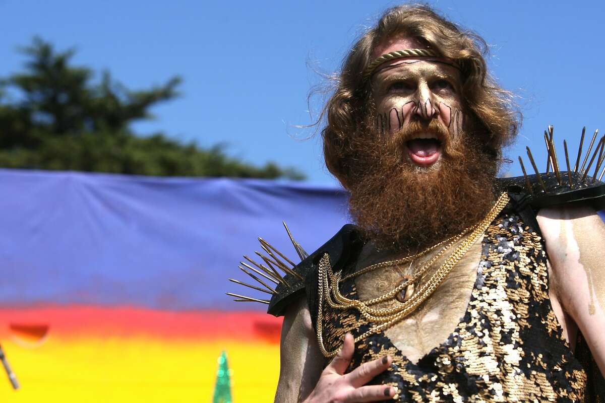 Competing for the Hunky Jesus, one contender encourages the crowd to roar for him during the Hunky Jesus contest at the 35th annual Easter Celebration put on by the Sisters of Perpetual Indulgence in Golden Gate Park, San Francisco, Calif. on April 20, 2014.