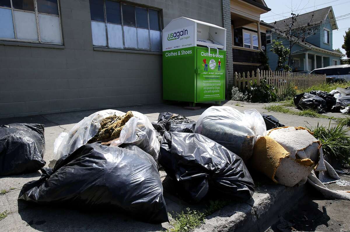 Oakland council looks at donation bins that attract dumpers
