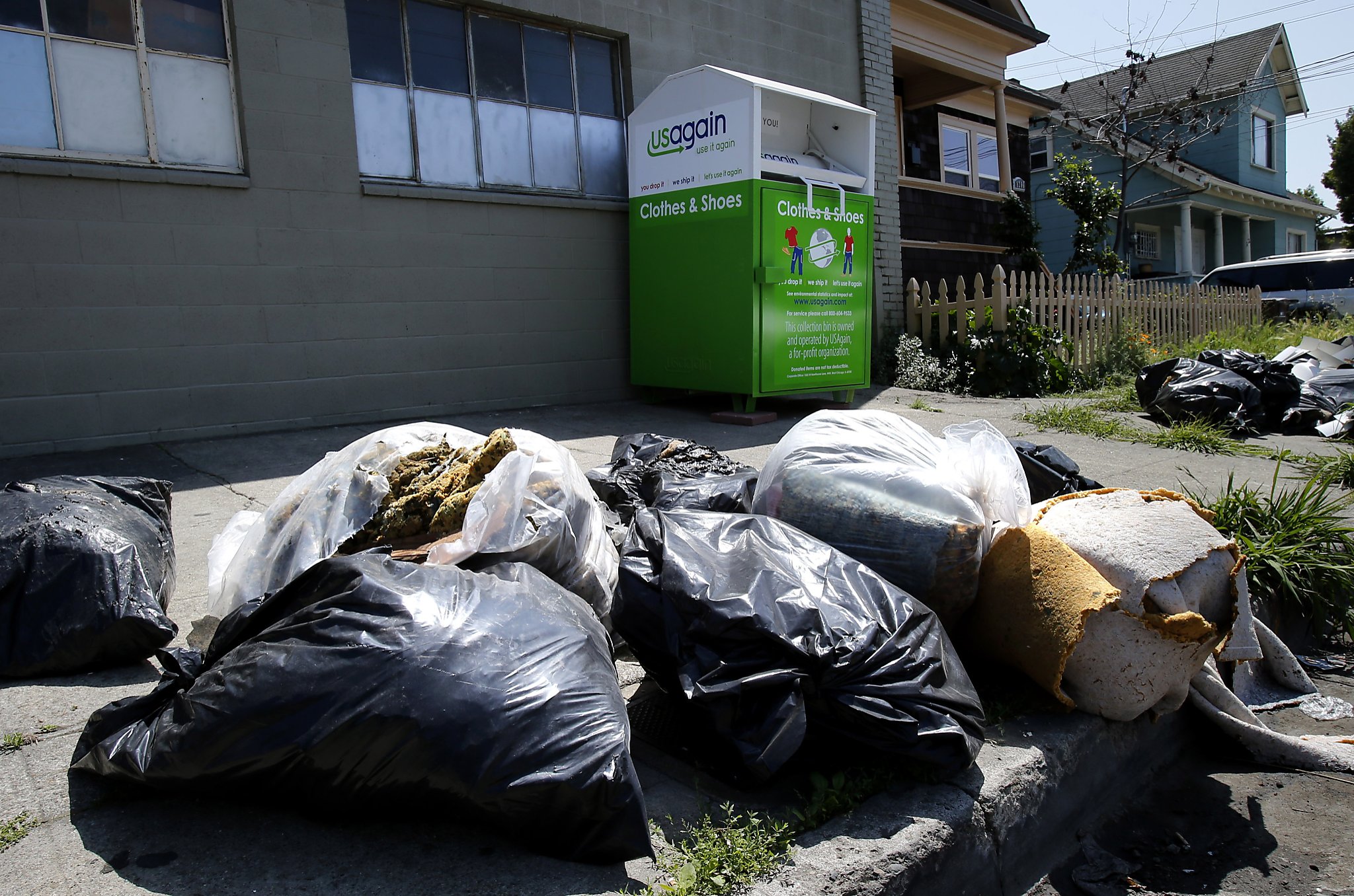 Oakland council looks at donation bins that attract dumpers