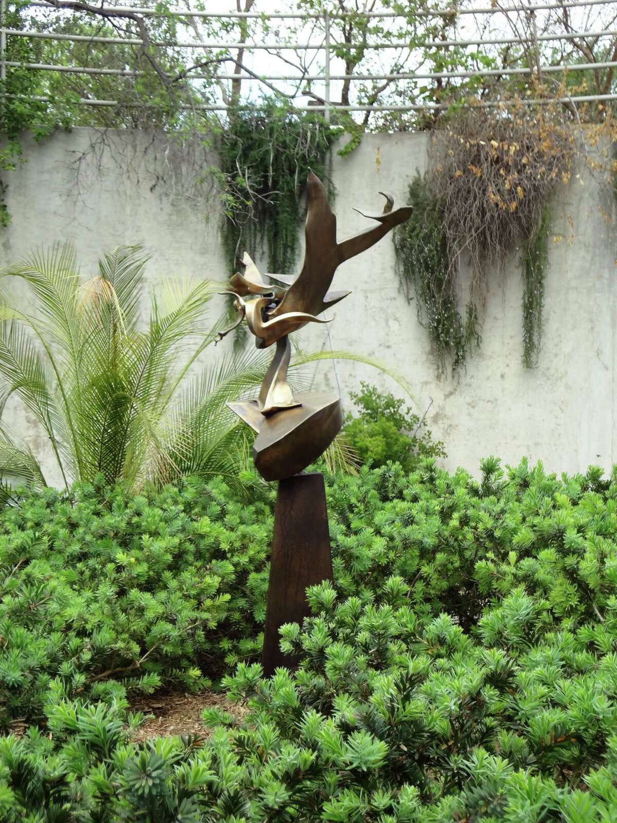 Richard Hunt's welded bronze "Poseidon" is part of "Art in the Garden" at the San Antonio Botanical Garden.