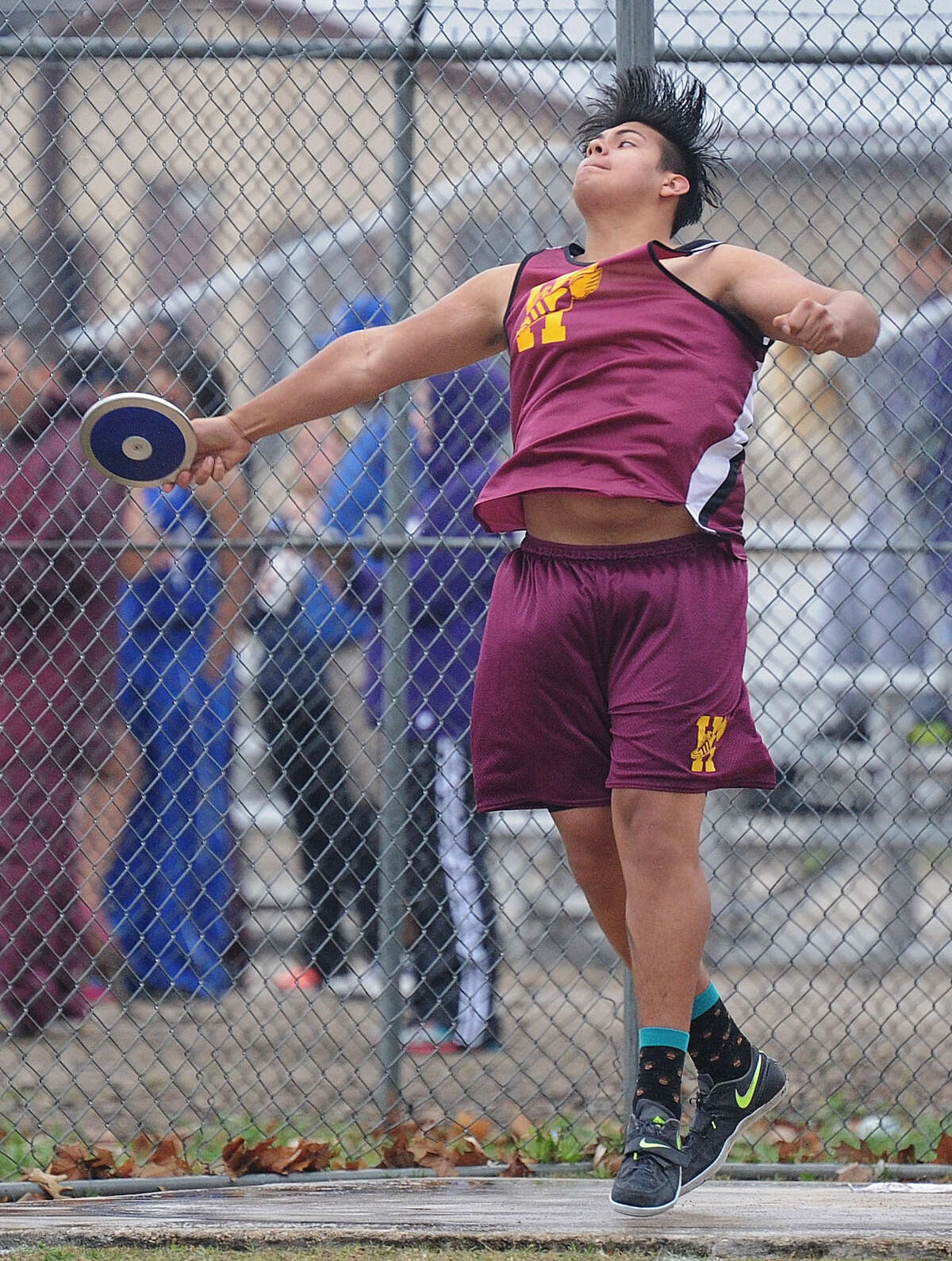 Andres Garcia of Harlandale hurls the discus at the District 29/30-4A meet April 16 at Gregory-Portland. He won second with a 152-9 distance. He also took first in the shot put with 54-6. Both of those distances are season-bests for Garcia.