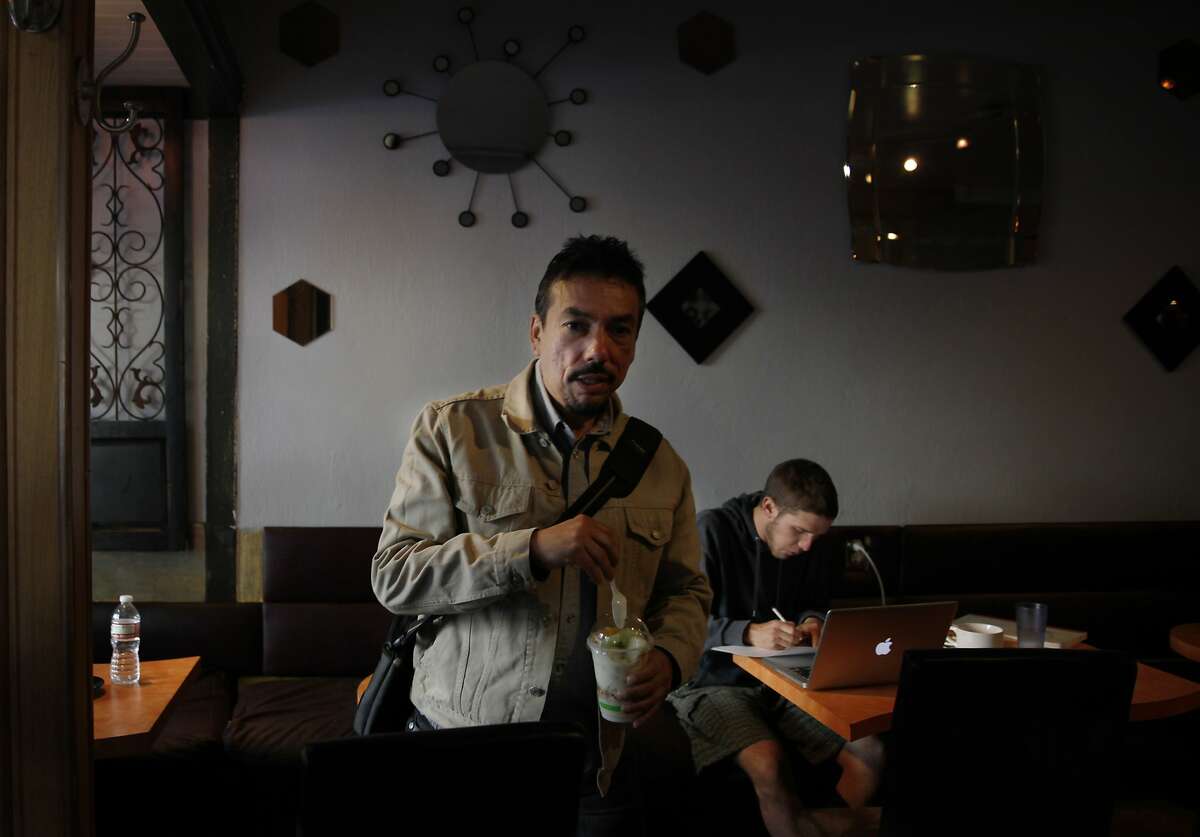 Erick Arguello, president of Calle 24, leaves L's Caffé on 24th Street in San Francisco.  “We’re not trying to keep people out,” said Arguello, the council’s president on the ban to temporarily stop construction of market-rate housing along 24th Street. “We’re trying to keep people in.”