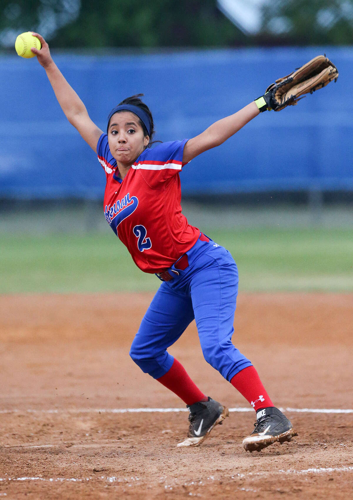 Jefferson's Mary Loera winds up for a throw to the plate in a game Thursday with Edison. Jefferson scored 12 runs in the seventh inning to beat the Lady Bears, 14-3.