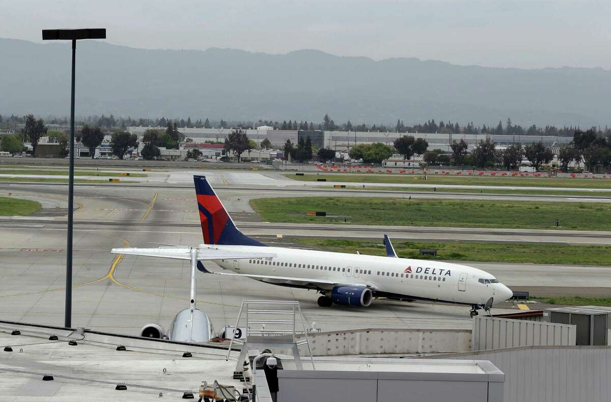 A plane taxis after landing at Mineta San Jose International Airport in April.