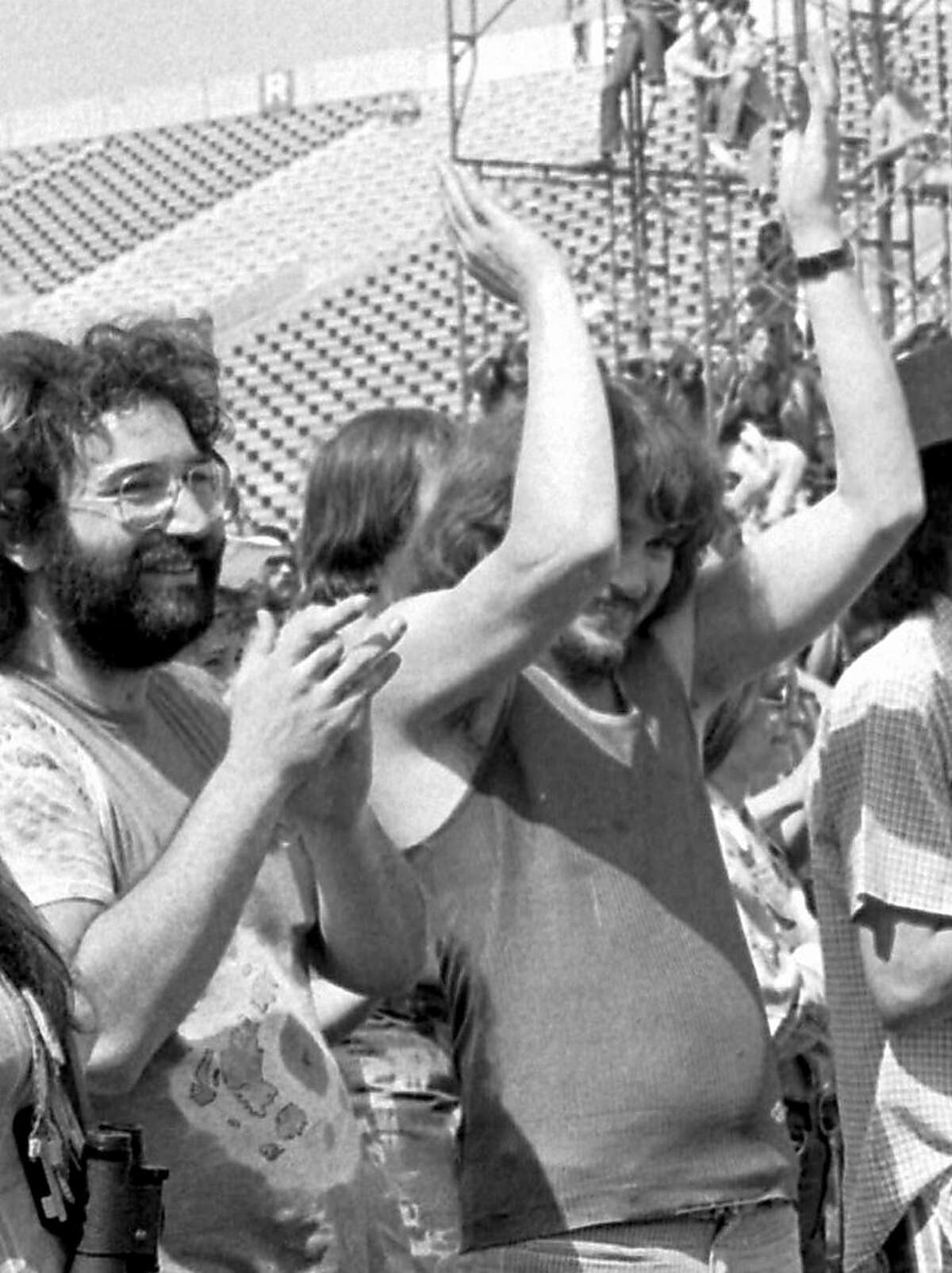 In this July 2, 1970, file photo, guitarist Jerry Garcia, of the band "The Grateful Dead," left, is joined by Delaney Bramlett, right, in Calgary, Canada, during the legendary "Festival Express," also known as the Transcontinental Pop Festival.  Recollections of the concert have resurfaced in recent years, with some saying they remember a concert being planned, but it being canceled. Arnold writes on his blog that even a Grateful Dead manager remembered the show to have happened.  "Various student memories arise, as they always do with the Dead, like that the Dead's equipment truck was driving by and they saw the Clam Jam going on and decided to just play," said Arnold. "Many colleges and town(s) have these stories, almost all, but not quite all, are not true." Arnold notes that Rick Adams, the drummer of Goodhill, a band that was set to perform at the show, remembered the show being cancelled.  "Because the Fairfield show was on every list through 2010, until I poked a hole in it, everyone assumes it happened, when it fact it appears it did not," added Arnold.