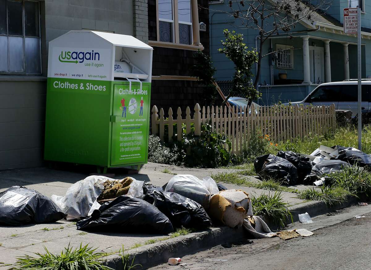 Oakland council looks at donation bins that attract dumpers